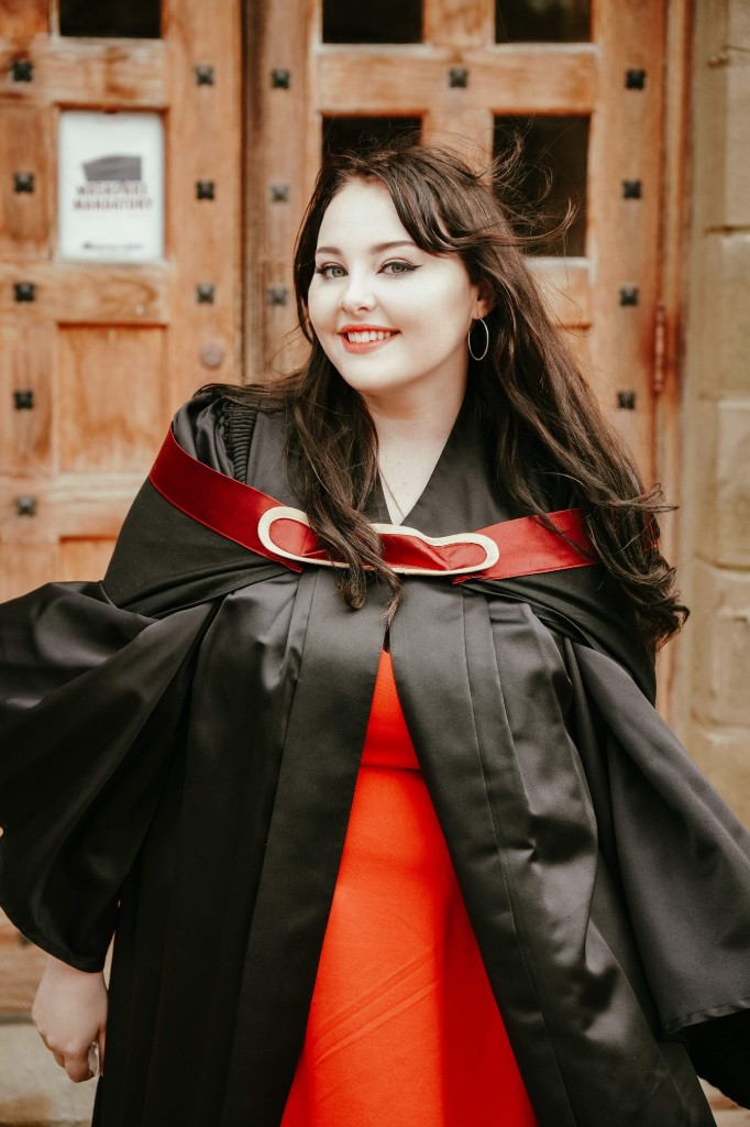 Sarah in graduation gown at Mount Allison